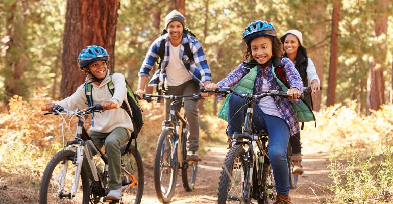 Family riding bikes