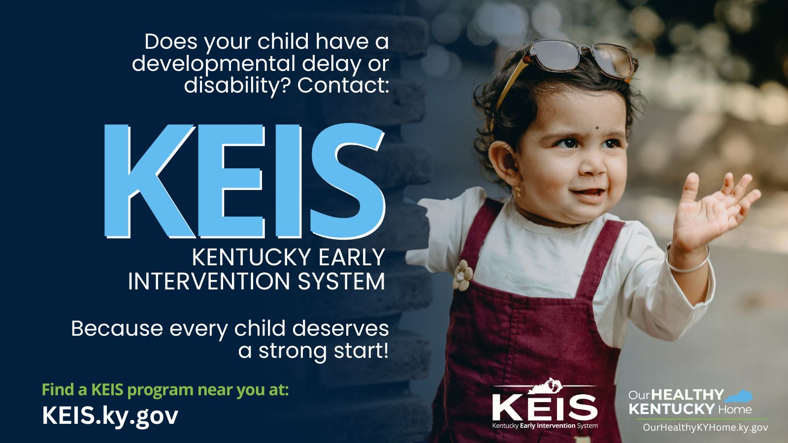 A toddler looking around a corner waving