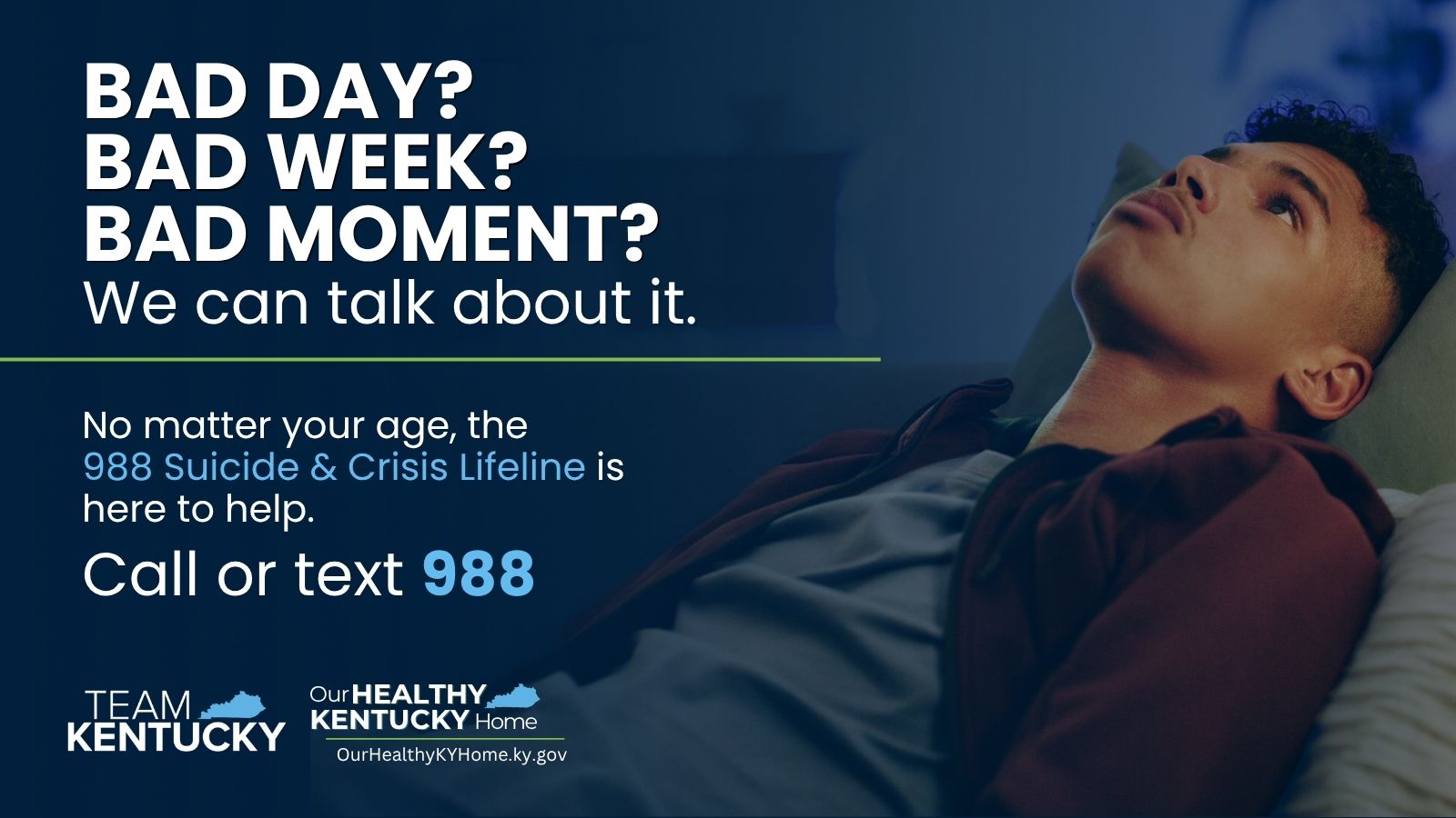 a teenage boy sitting on a couch staring up at the ceiling