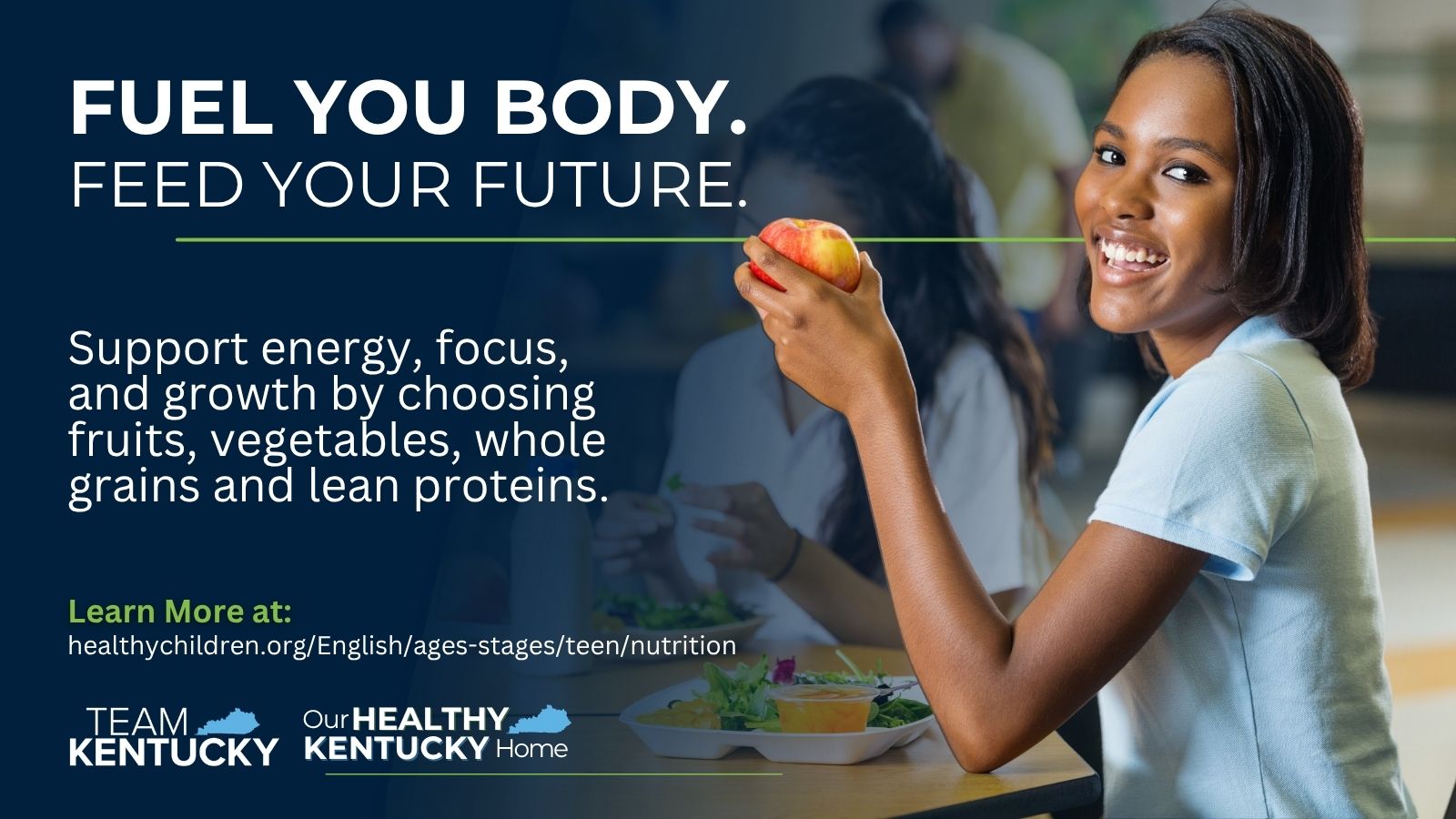 Teenage girl smiling at camera holding an apple